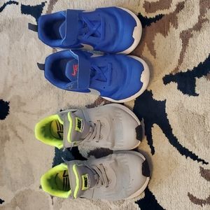 Two pairs of boys Nike shoes